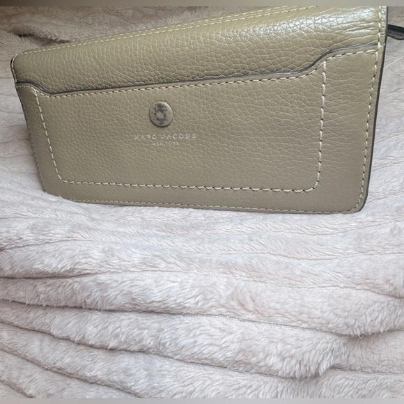 Marc Jacobs Handbags - Marc Jacobs Tan Leather Bifold Wallet  mod: M0013050 slight button wear